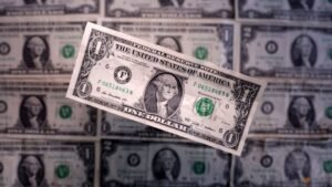 Dollar retreats from 18-month high despite strong inflation data