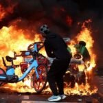 Paris police ban people carrying petrol or fireworks following weekend riots