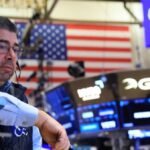 Stocks fall, but tech shares steady after selloff; oil hits highest in nearly six months