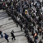 Fresh clashes rock France as protesters march on