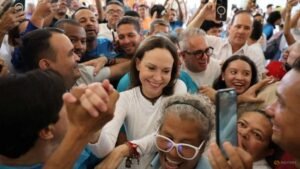 Venezuela opposition leader Machado returns home after fraught year away