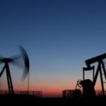 Oil prices down almost $1 in early trading