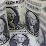 Euro edges higher against dollar after ECB leaves rates unchanged