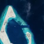 China conducts combat readiness patrols around disputed shoal in South China Sea