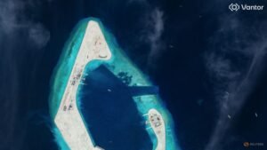 China conducts combat readiness patrols around disputed shoal in South China Sea