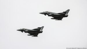 Ukraine apologizes after a suspected drone crashes in Lithuania, damaging a moving car.