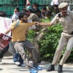 Indian police crack down on ‘Cockroach’ protest in Delhi