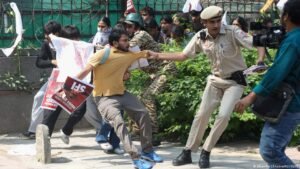 Indian police crack down on ‘Cockroach’ protest in Delhi