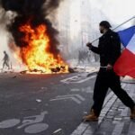 Weekend of fiery protests in France raises questions, costs millions