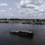 Congo river boat collision kills at least 30 as search continues for missing