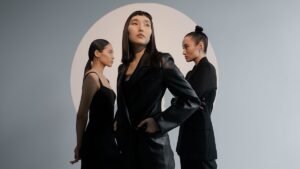Why do we keep buying black clothes – even when we want to wear more colour?