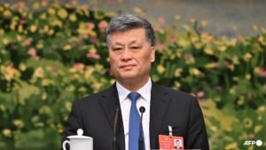 China strips generals, ex-financial regulator, politburo member of lawmaker posts
