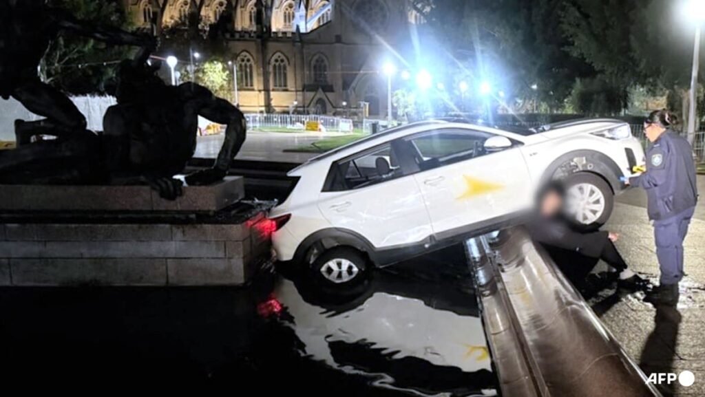 Frenchman eating McDonald’s crashes into historic Sydney fountain, police say