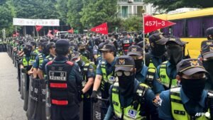 South Korean riot police clear protesters after ballot shortage blockade