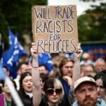 Thousands turn out for anti-racism rally after Belfast unrest
