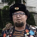 Russian artist critical of Putin shot dead in Poland, officials say