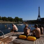 Paris invites locals to cool off in canal during 40C heatwave