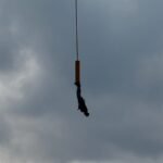 Young woman dies after being launched off bridge without safety rope