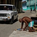 Cuban president unveils reforms to liberalise economy amid US embargo