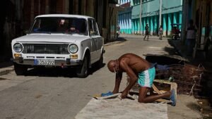 Cuban president unveils reforms to liberalise economy amid US embargo