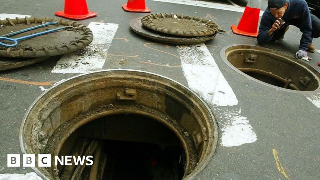 New York police investigate videos of men emerging from city’s sewer system