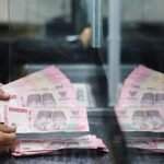 Indonesia raises rates in surprise move to prop up sinking rupiah