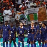 France brush off Ivory Coast loss, call it timely World Cup reminder