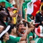 Mexicans celebrate breaking opening day curse with 2-0 win