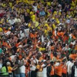 Feeling priced out of tickets to watch their teams at the World Cup, fans opt for cheaper matches