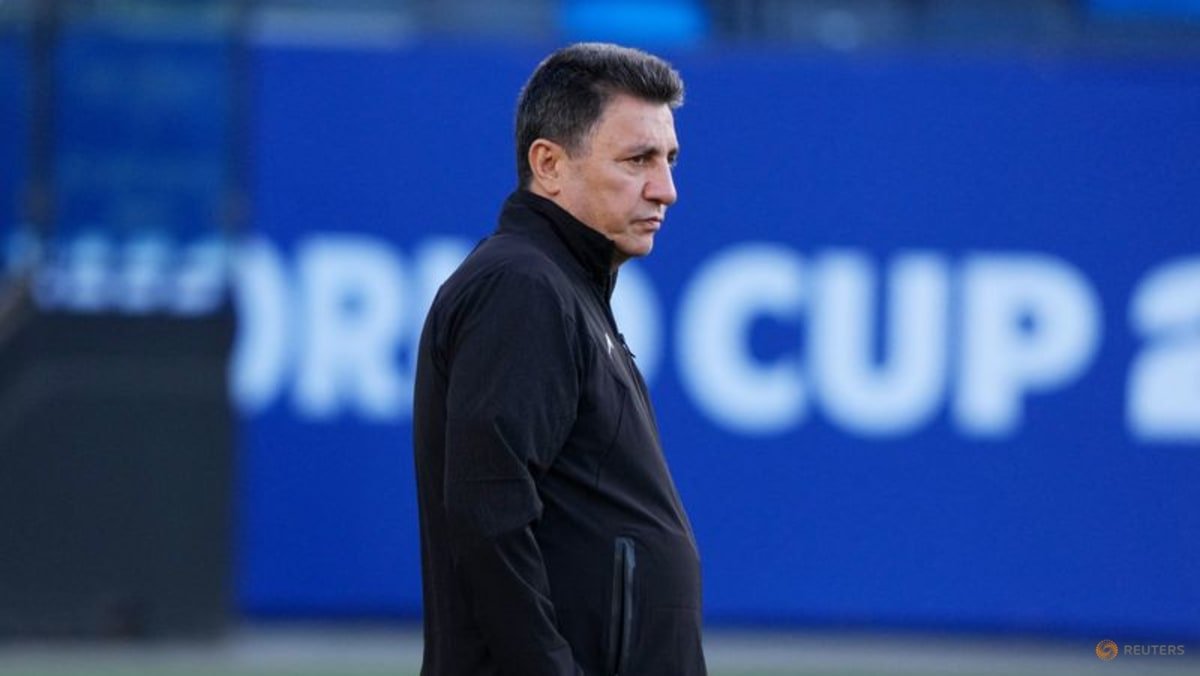 Iran’s manager, striker pledge to play for all Iranians despite protests