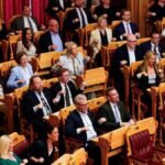 Norwegian parliament gets behind World Cup team with fans’ Viking rowing display