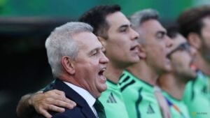 Aguirre downplays milestone after Mexico top World Cup group for first time since 2002