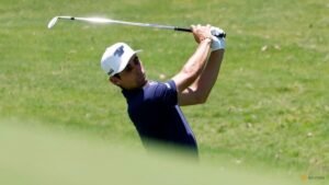 Niemann handed two-stroke penalty for throwing club at US Open