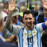 Milestone Messi sends Argentina to World Cup knockout stage