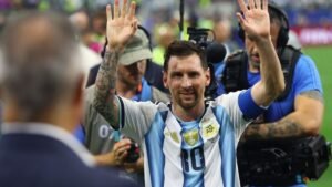 Milestone Messi sends Argentina to World Cup knockout stage