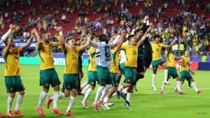 Australia reach World Cup knockouts after goalless draw with Paraguay