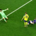 Japan through to World Cup last 32 after 1-1 draw with Sweden
