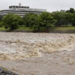 Four injured, flights cancelled in Japan as twin storms approach