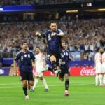 Messi scores again as Argentina head into World Cup last 32 on a high