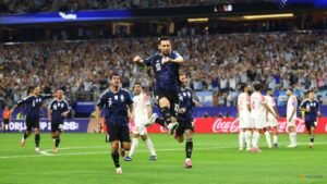 Messi scores again as Argentina head into World Cup last 32 on a high