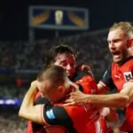 Austria and Algeria advance to World Cup round of 32, Iran eliminated