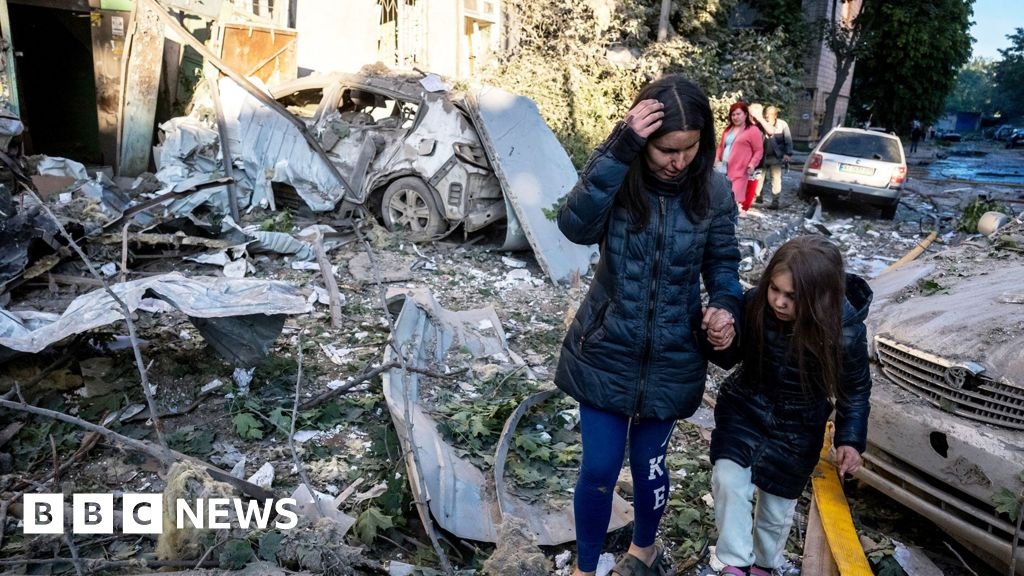 Ukraine rescuers pull dead from rubble after Russian strikes kill 18