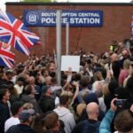 UK: 6 more charged after violent protest over stabbing death