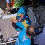 Family questions rescue efforts for Sherpa guide found alive on Everest, seeks legal action