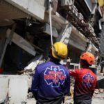 Rescuers race to reach trapped victims after powerful quake in southern Philippines