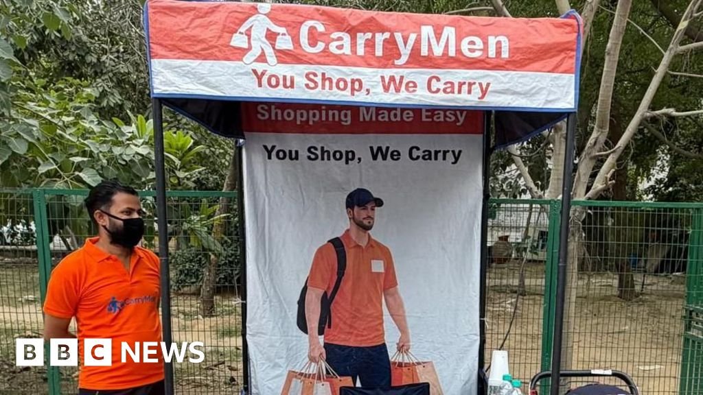 CarryMen: India start-up offering shopping bag carriers sparks debate on entitlement