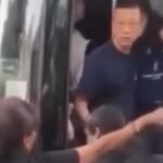 Hong Kong principal fired over Singapore row says he will seek legal advice