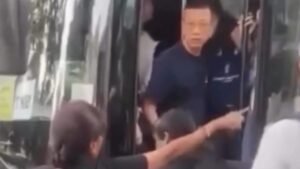 Hong Kong principal fired over Singapore row says he will seek legal advice