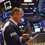 Stocks drop on tech sell-off, oil yo-yos on Mideast