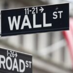 Wall Street closes down sharply after Fed holds rates unchanged